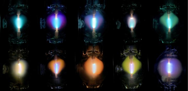 Various highly loaded arcs

The series presented here shows the structure of arcs burning in various atmospheres, resulting in different color patterns. All these lamps are based on the Philips MSR 200 W burner, characterized by a 5-mm electrode gap length and filled with a mercury dose resulting in a 30-bar buffer pressure during operation. Except for one, these lamps are all filled with a single metal halide additive of the type usually used in metal halide lamps intended for sport, stage, and studio lighting applications. From left to right we have:

Top - no additive, mercury iodide (HgI2), mercury bromide (HgBr2), cesium bromide (CsBr), cerium bromide (CeBr3)

Bottom -  cerium iodide (CeI3), dysprosium bromide (DyBr3), dysprosium iodide (DyI3), thulium bromide (TmBr3), manganese iodide (MnI2)


Keywords: Lamps
